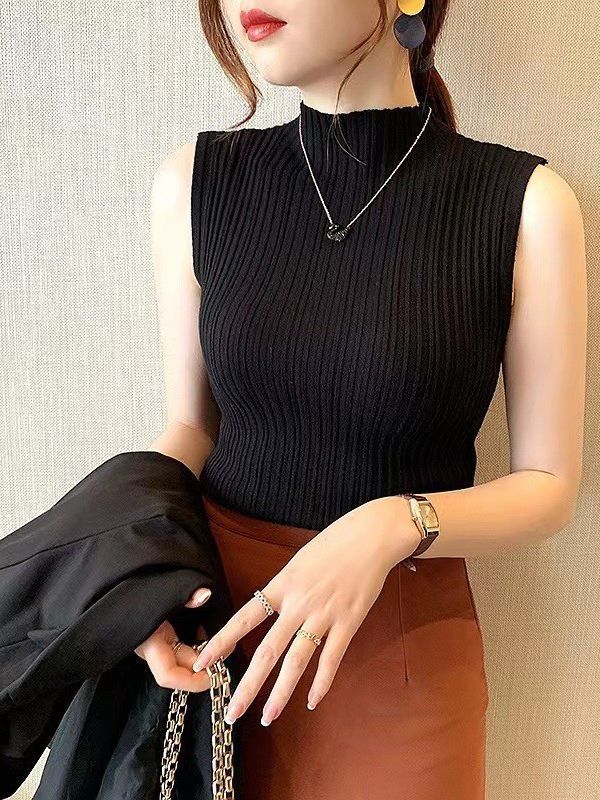 women-sleeveless-camisole-black
summer-cami-top-apricot-color
model-wearing-solid-color-camisole
womens-polyester-sleeveless-top