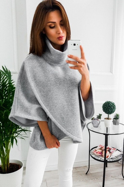 women-plush-lined-cardigan-sweatshirt-black
warm-winter-fake-two-piece-top-blue
model-wearing-batwing-long-sweatshirt-grey
cozy-autumn-winter-button-up-cardigan-green