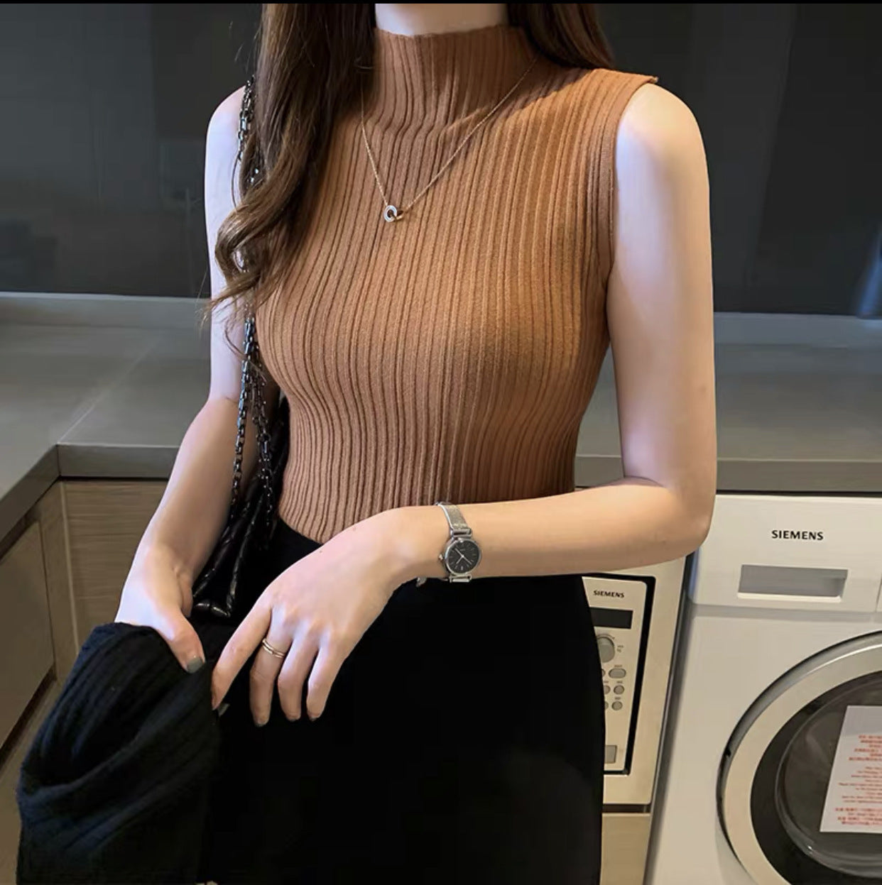 women-sleeveless-camisole-black
summer-cami-top-apricot-color
model-wearing-solid-color-camisole
womens-polyester-sleeveless-top