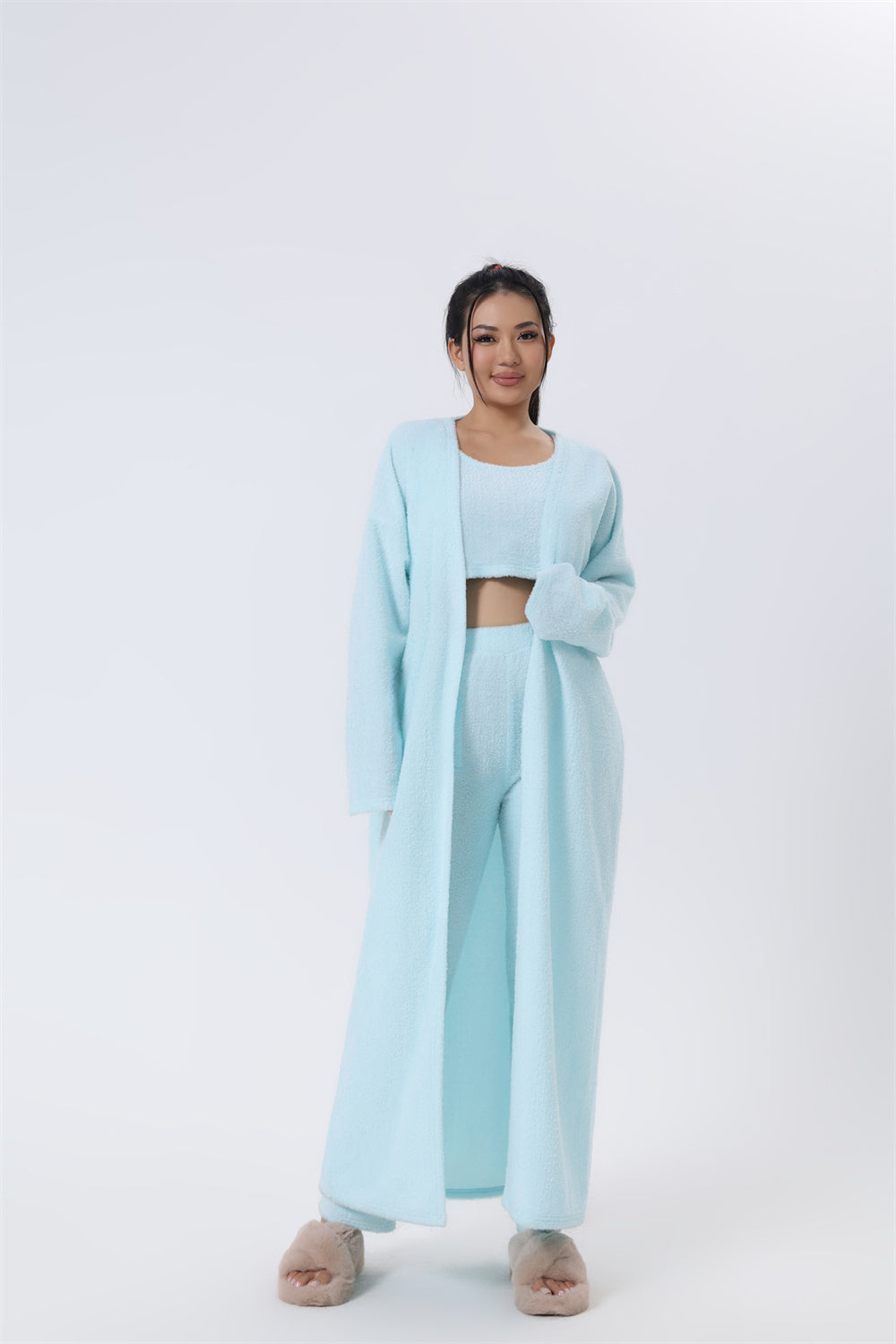 cozy-3-piece-lounge-set-white-model

womens-knit-pajama-set-camel-color

crop-top-wide-leg-pants-cardigan-set