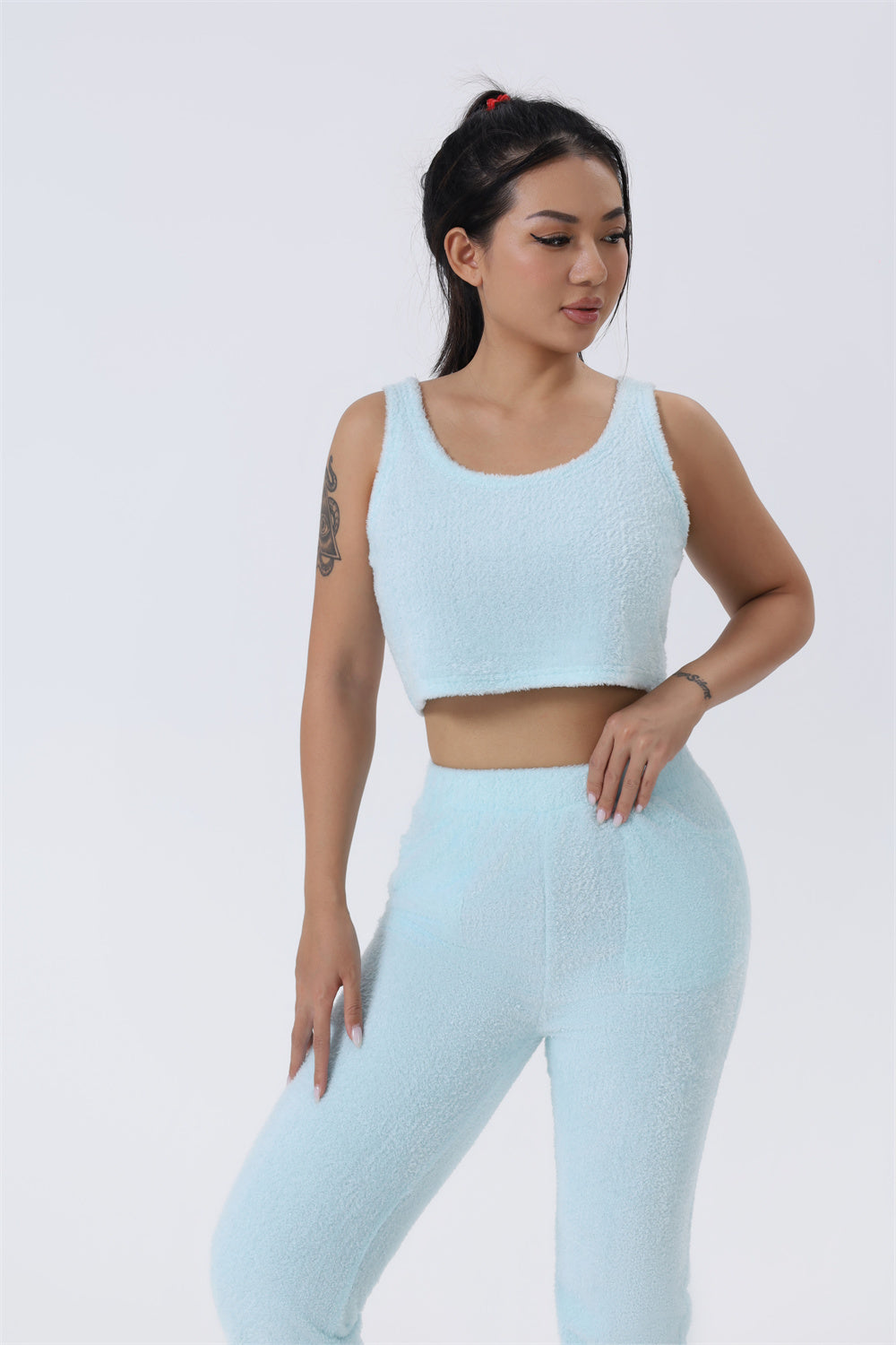 cozy-3-piece-lounge-set-white-model

womens-knit-pajama-set-camel-color

crop-top-wide-leg-pants-cardigan-set