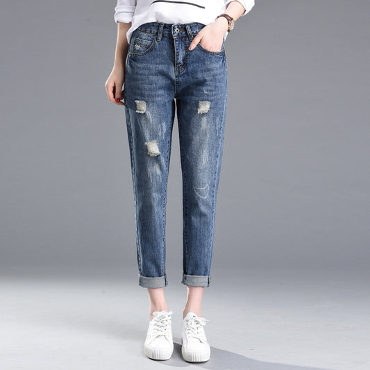 womens-high-waisted-ripped-skinny-jeans-dark-wash

model-wearing-ankle-length-distressed-jeans

close-up-ripped-denim-details-women

womens-slim-fit-ripped-jeans-front-back