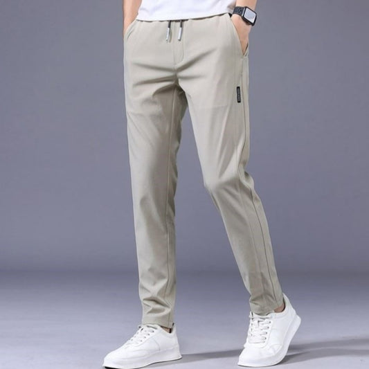 men's-korean-drawstring-trousers-khaki

loose-fit-casual-pants-men-black

male-model-wearing-straight-leg-sweatpants-dark-gray

thin-summer-trousers-korean-fashion