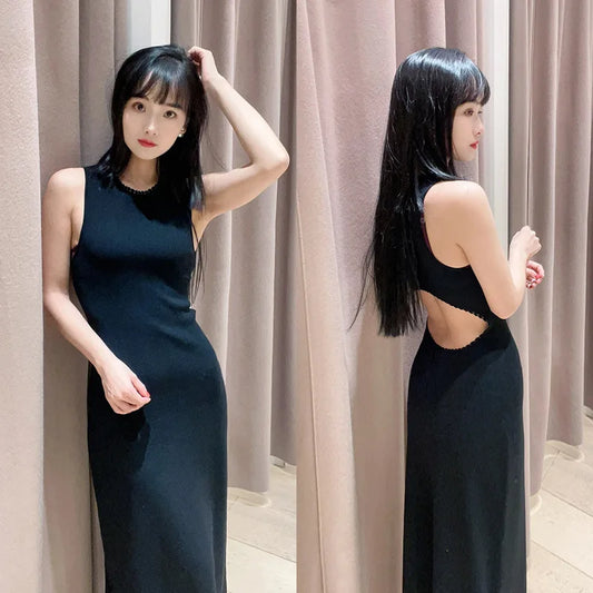 elegant-backless-knit-dress-black

women-sleeveless-knitted-midi-dress

backless-slim-fit-long-black-dress

hollow-out-knit-dress-detail